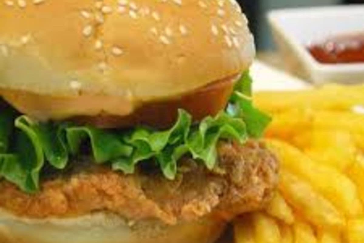 Crispy Chicken Burger with Fries and Can of Coke