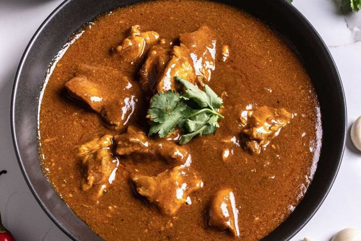84. Goat Vindaloo (22oz)