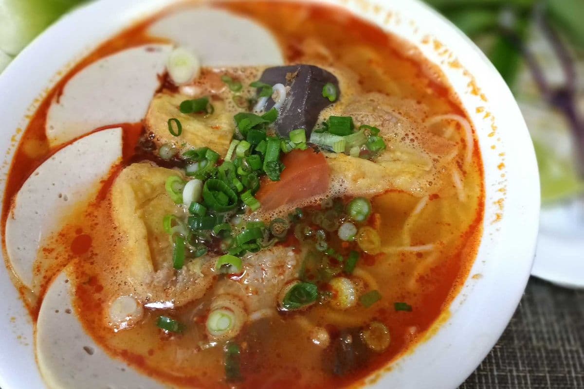 216. Tomato Soup with Crab Paste, Tofu, Pork Jelly, and Vermicelli