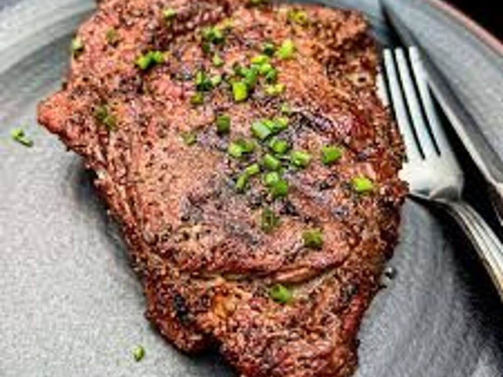 13oz Ribeye Steak (w/ Mush wine sauce)