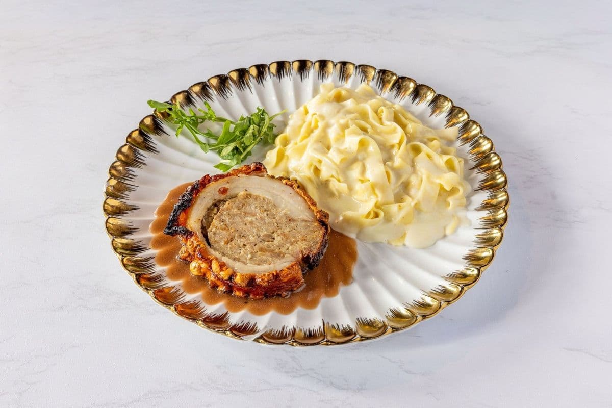 Italian Porchetta served with Alfredo Pasta