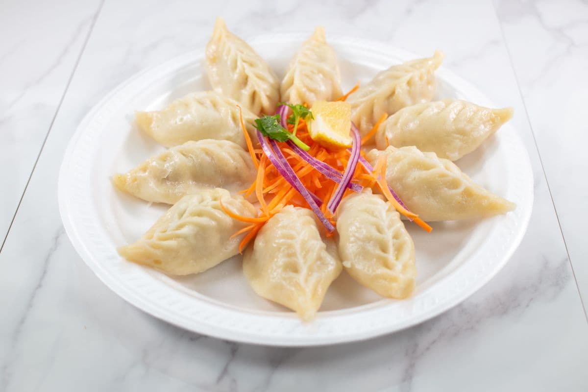 23-P. Pork Steamed Momo(10 pcs)