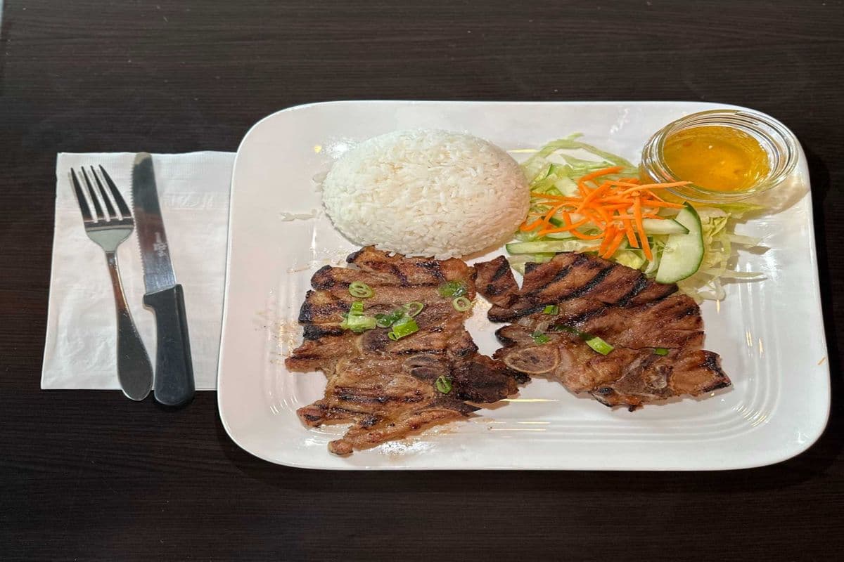 202. Grilled Pork Chop on Rice.