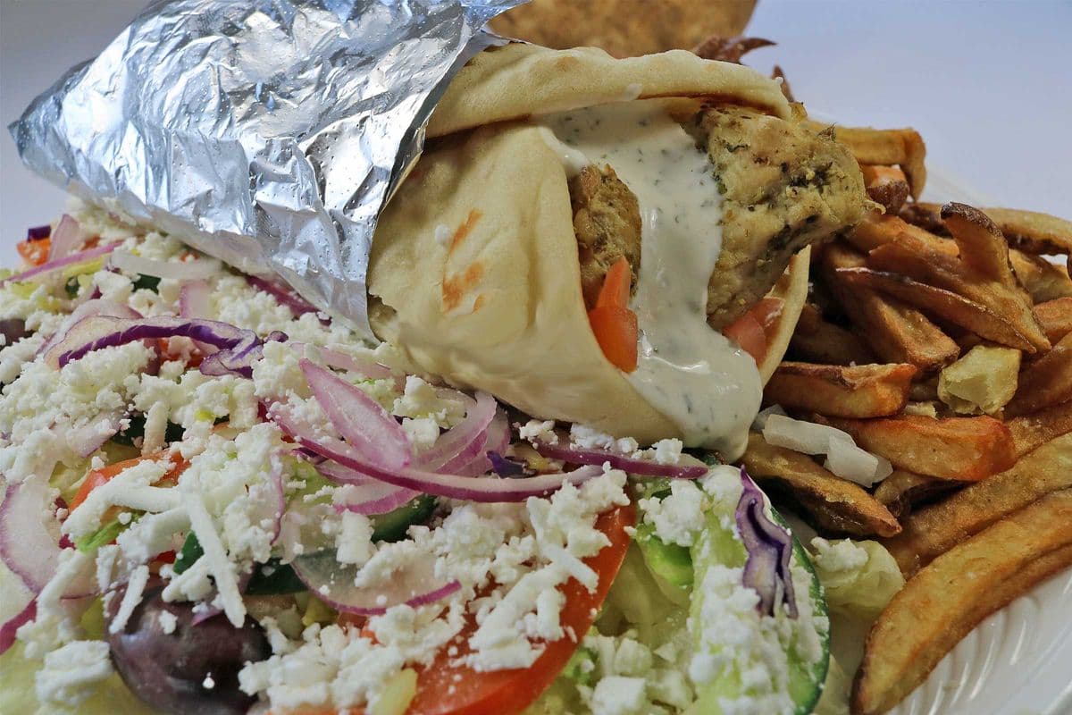 Chicken Souvlaki on a Pita with Greek Salad and Fries