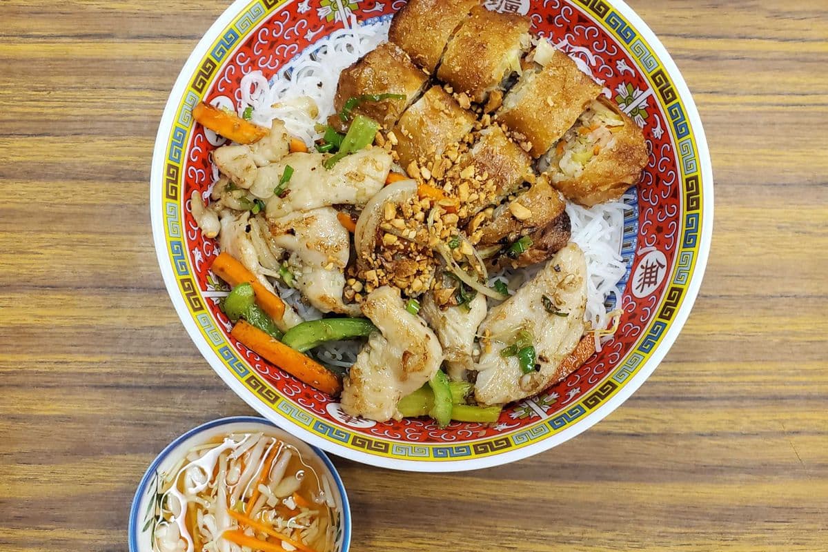 96. Rice Vermicelli with Lemongrass Beef or Chicken and Spring Rolls