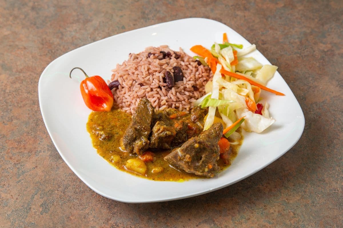 Curry Goat with Rice and Peas, and Steam Veggies