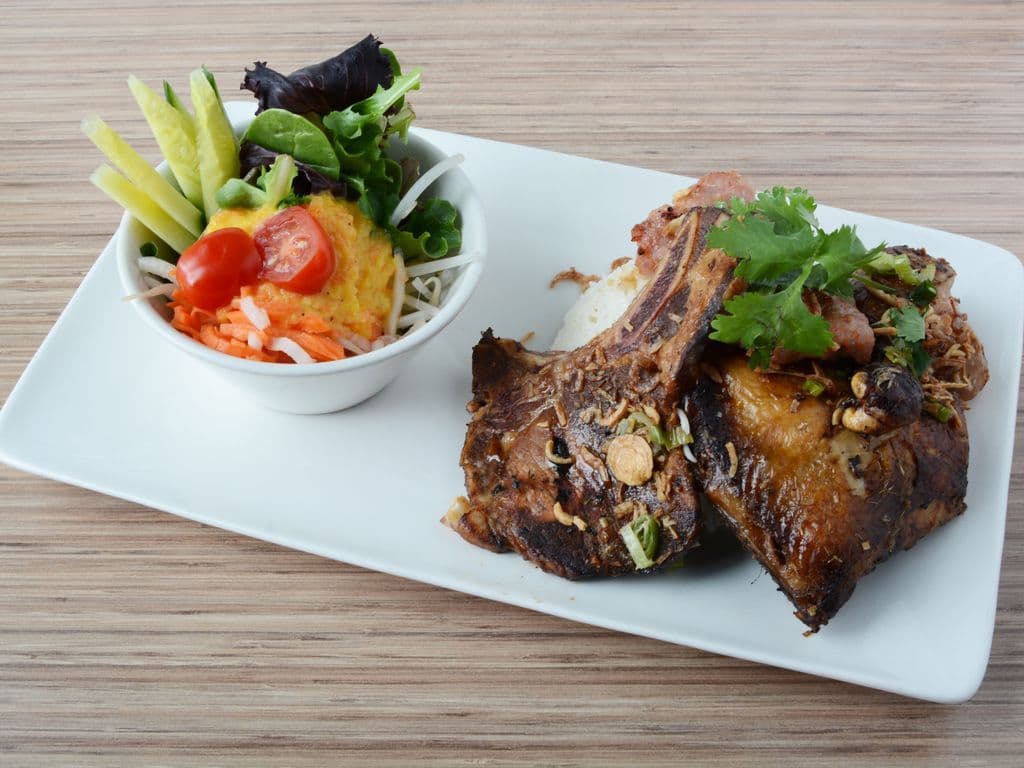 64. Pork Chop, Pork Patty & Chicken Leg with Rice & Salad