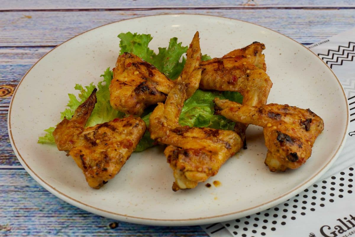 Six Whole Wings with a Regular Side