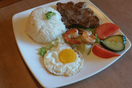 301. BBQ Lemongrass, Pork Chop, BBQ Shrimp, and Fried Egg on Rice