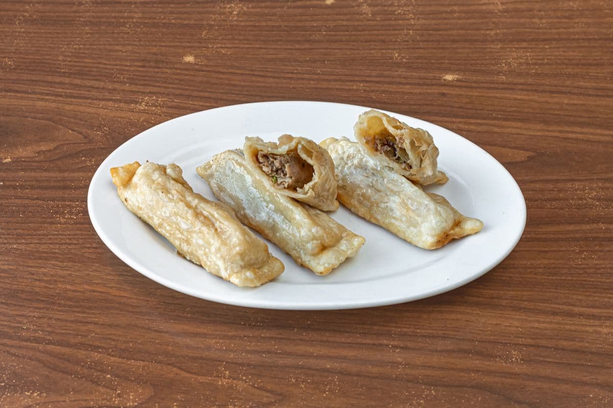 213. Pan-Fried Pork Dumplings (4 pcs)