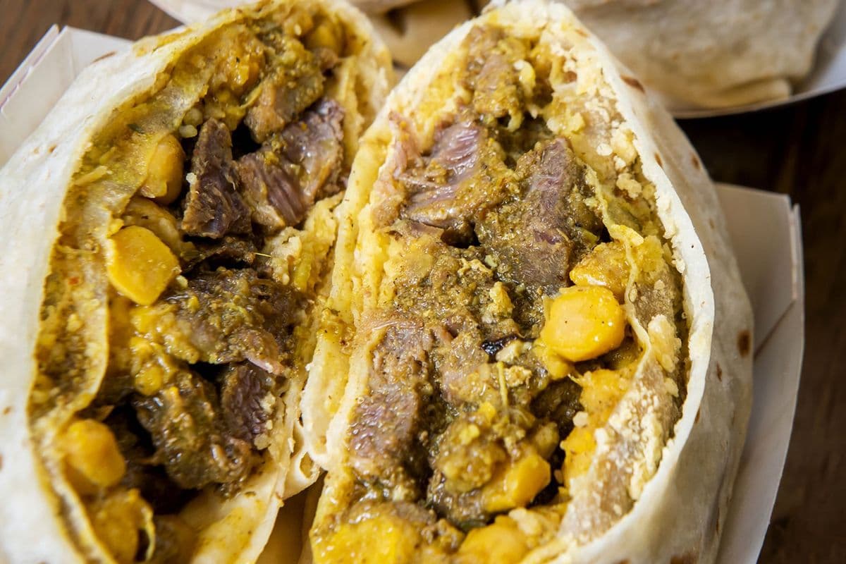 Bonelesss Curry Goat Roti Wrap