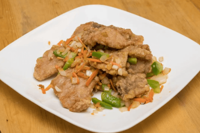 60. House Special Pork Chops