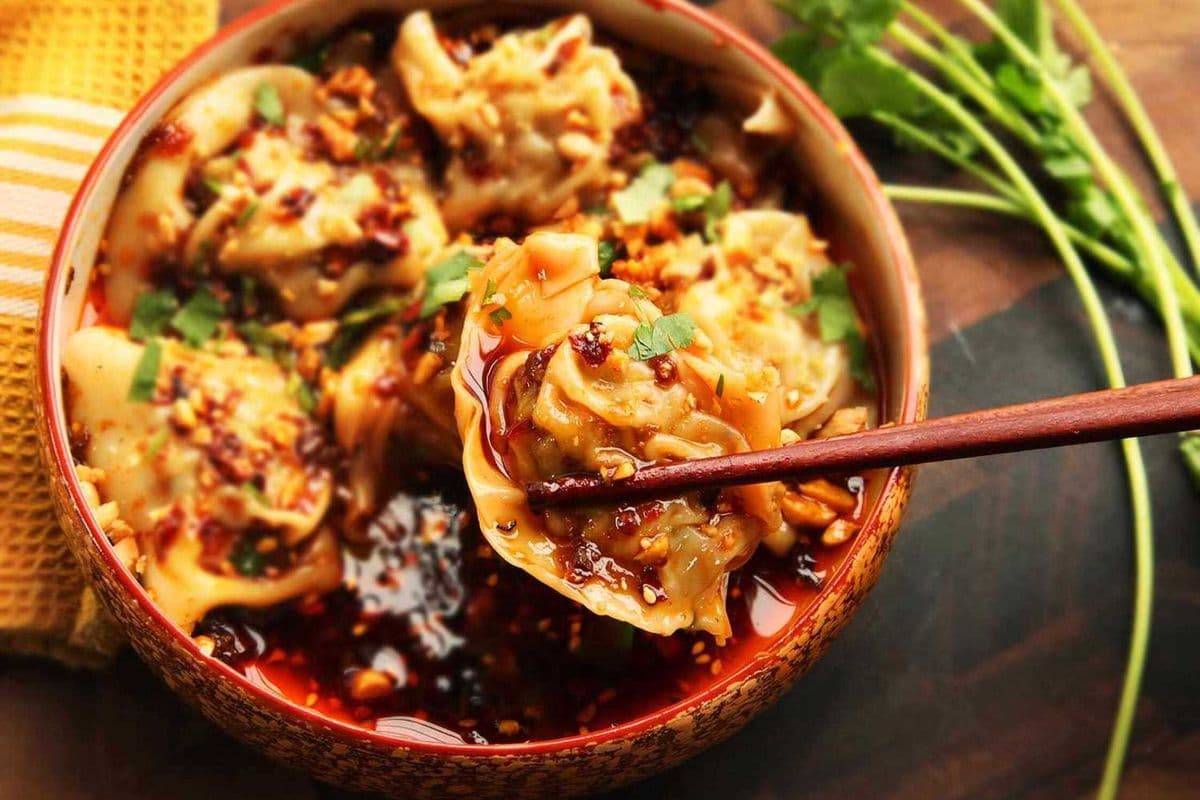 11. Steamed Wontons in Szechian Hot and Sour Sauce (5)