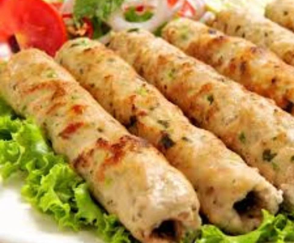 Chicken Kofta Kabab with Fries, Tabbouleh, Hummus Dip, Garlic Sauce, and Pop