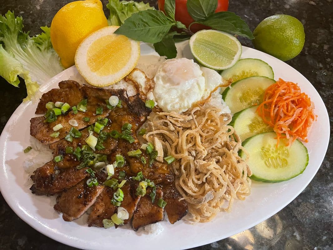 E50. Grilled Pork Chop, Shredded Pork, Sunshine Egg on Steam Rice