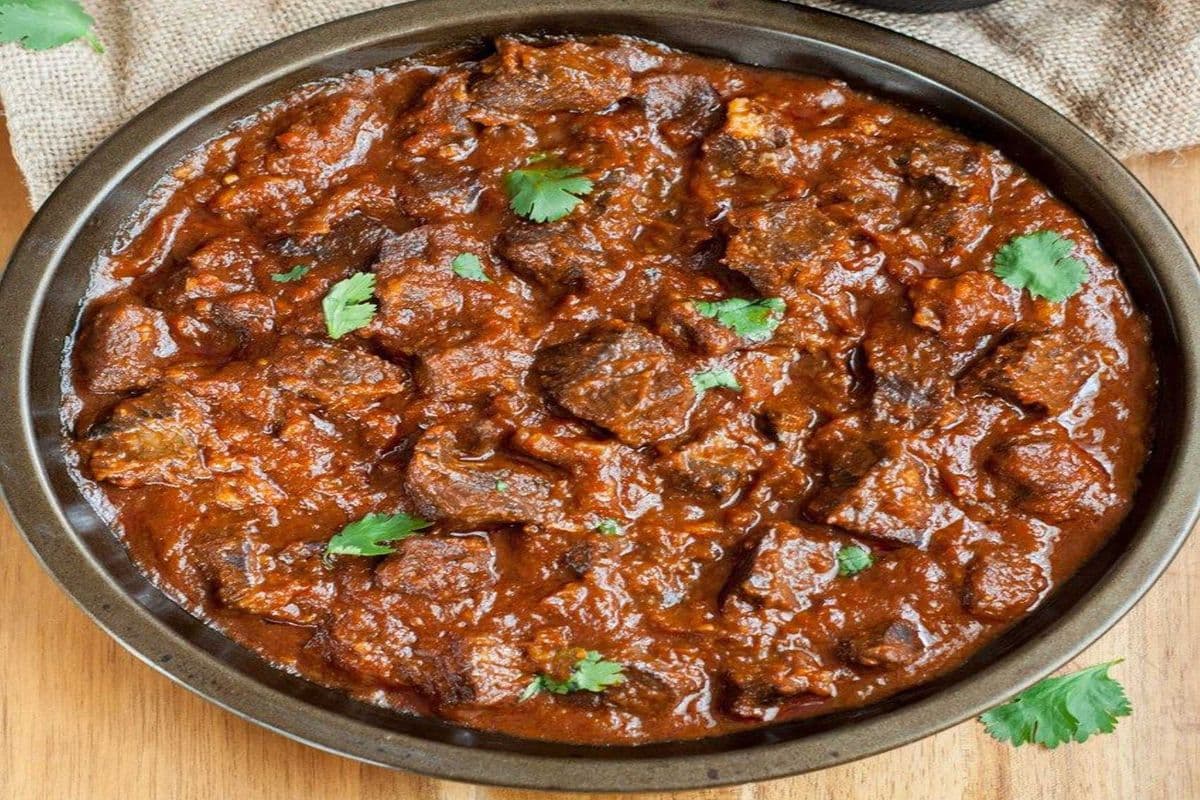 50. Beef Curry (220z)
