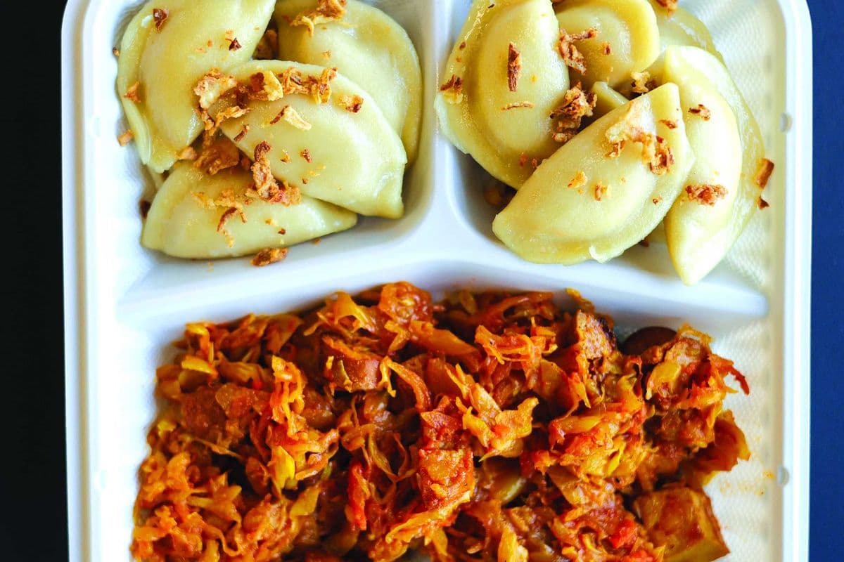 Stampede Combo Perogies and Stew Sauerkraut with Sausages