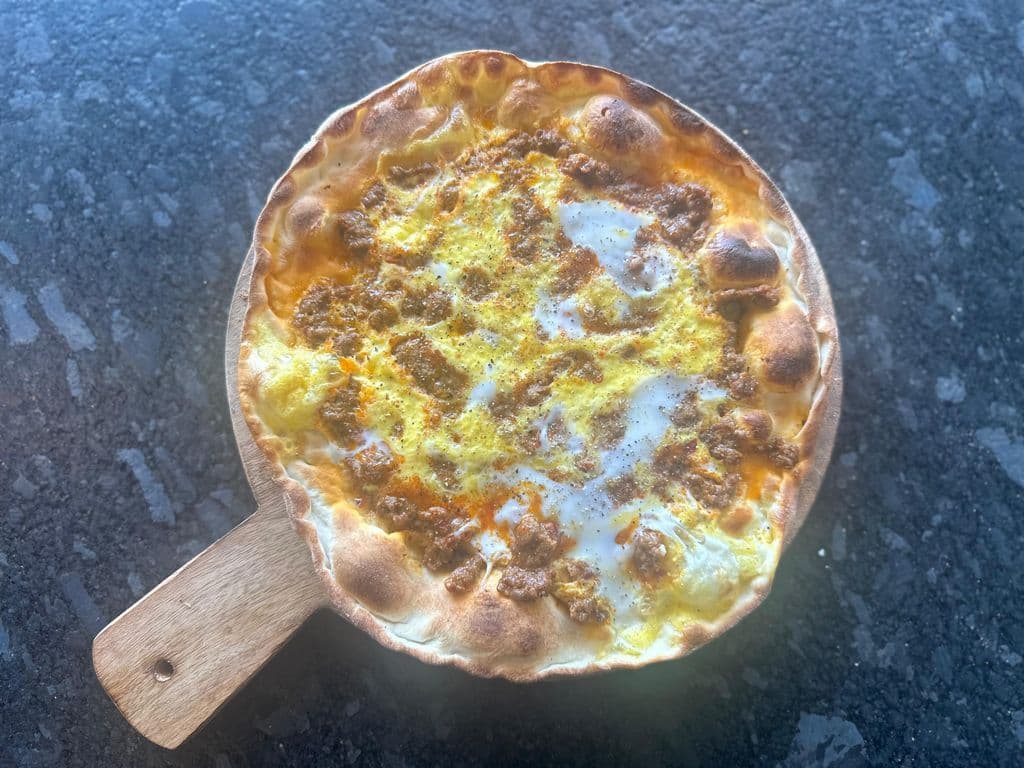 Sujuk with Egg Manakish
