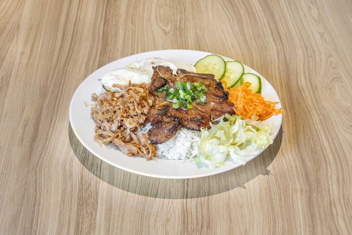 47. Grilled Pork Chop (1 pc), Shredded Pork, and Eggs (2 pcs) on Steamed Rice