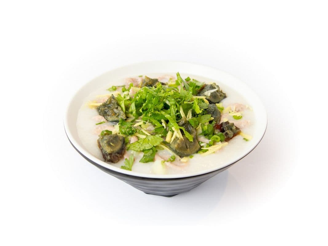 C9 Shredded pork and gold preserved egg Congee / 皮蛋瘦肉粥 C9
