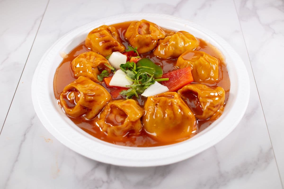 30. Butter Chicken Momo (10 pcs)