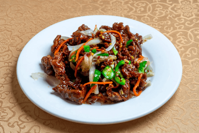 22. Sliced Beef in Szechuan Sauce on Hot Plate