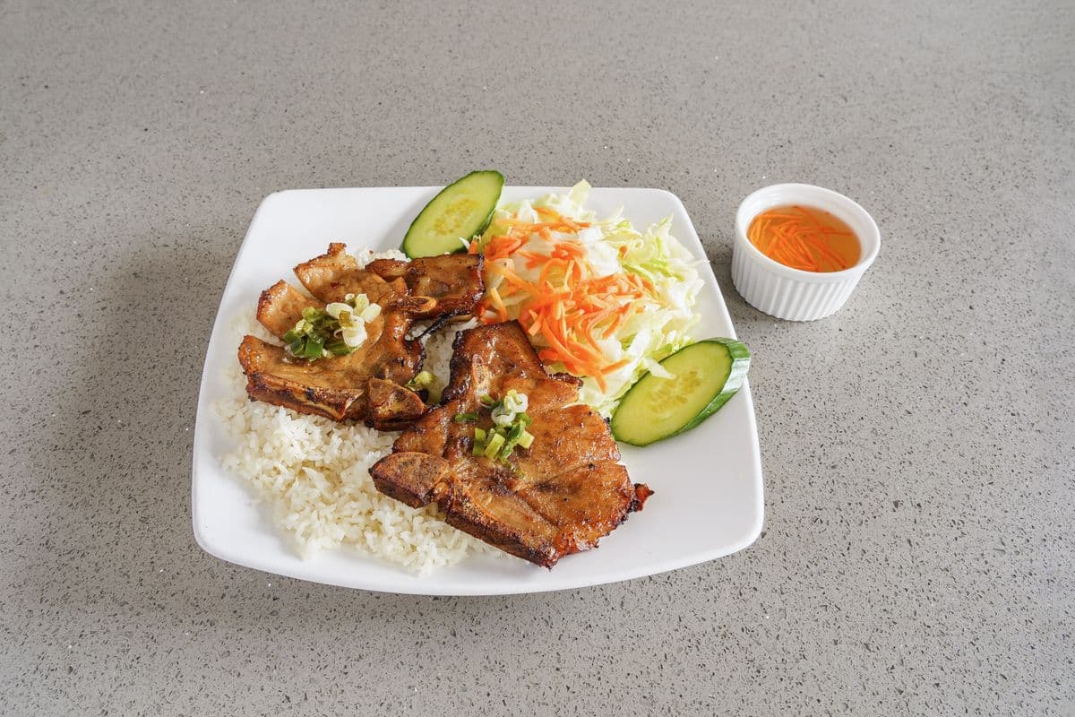 R61. Two Grilled Pork Chops on Steam Rice