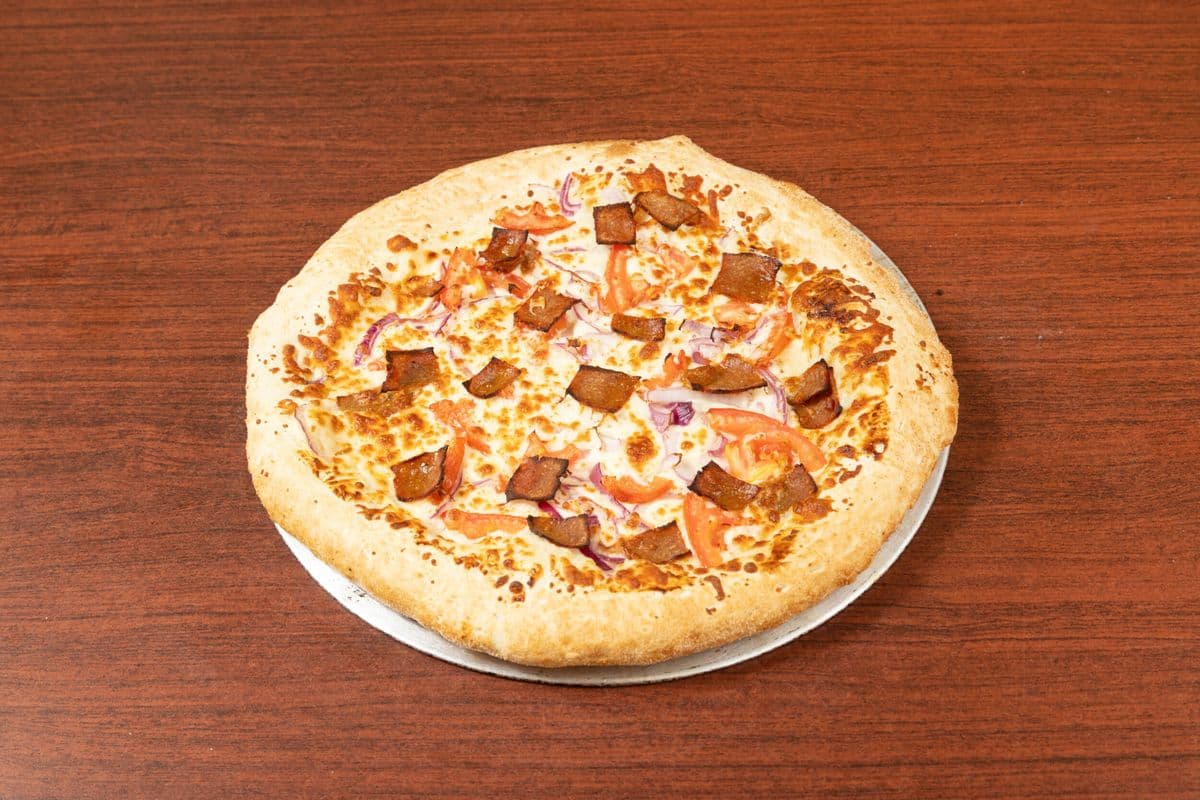Family Deal One - One Large Pizza with Three Toppings, Ten Wings, Three Pops, One Dip, and Wedges