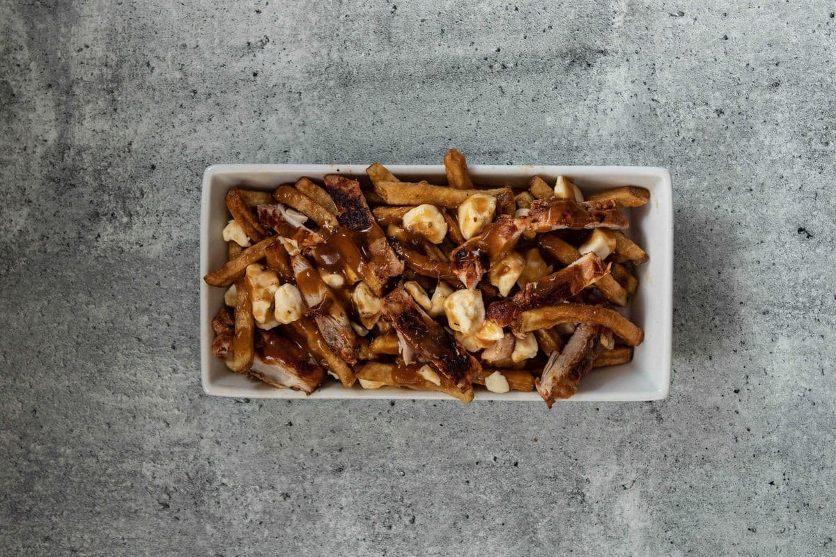 Poutine avec du poulet Taouk (poulet mariné ) - Poutine with Taouk chicken (Grilled Chicken)