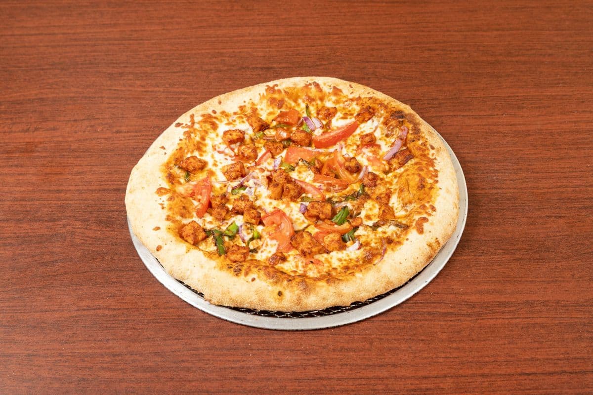Family Deal One - One Extra-Large Pizza with Three Toppings, Ten Wings, Three Pops, One Dip, and Wedges