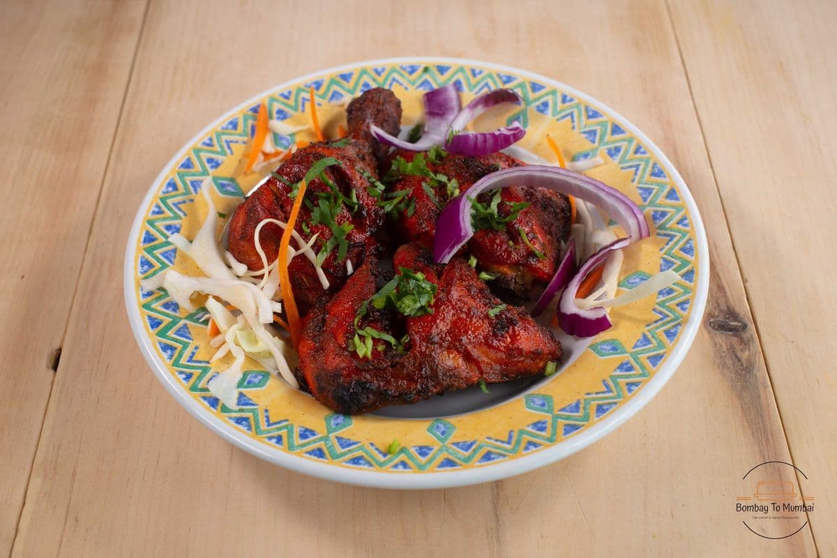 6. Tandoori Chicken (Chicken with Bones with Naan)