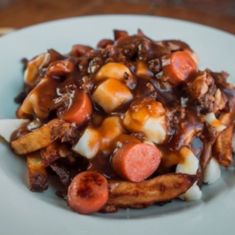 La Tour du Chapeau / Hat Trick Poutine