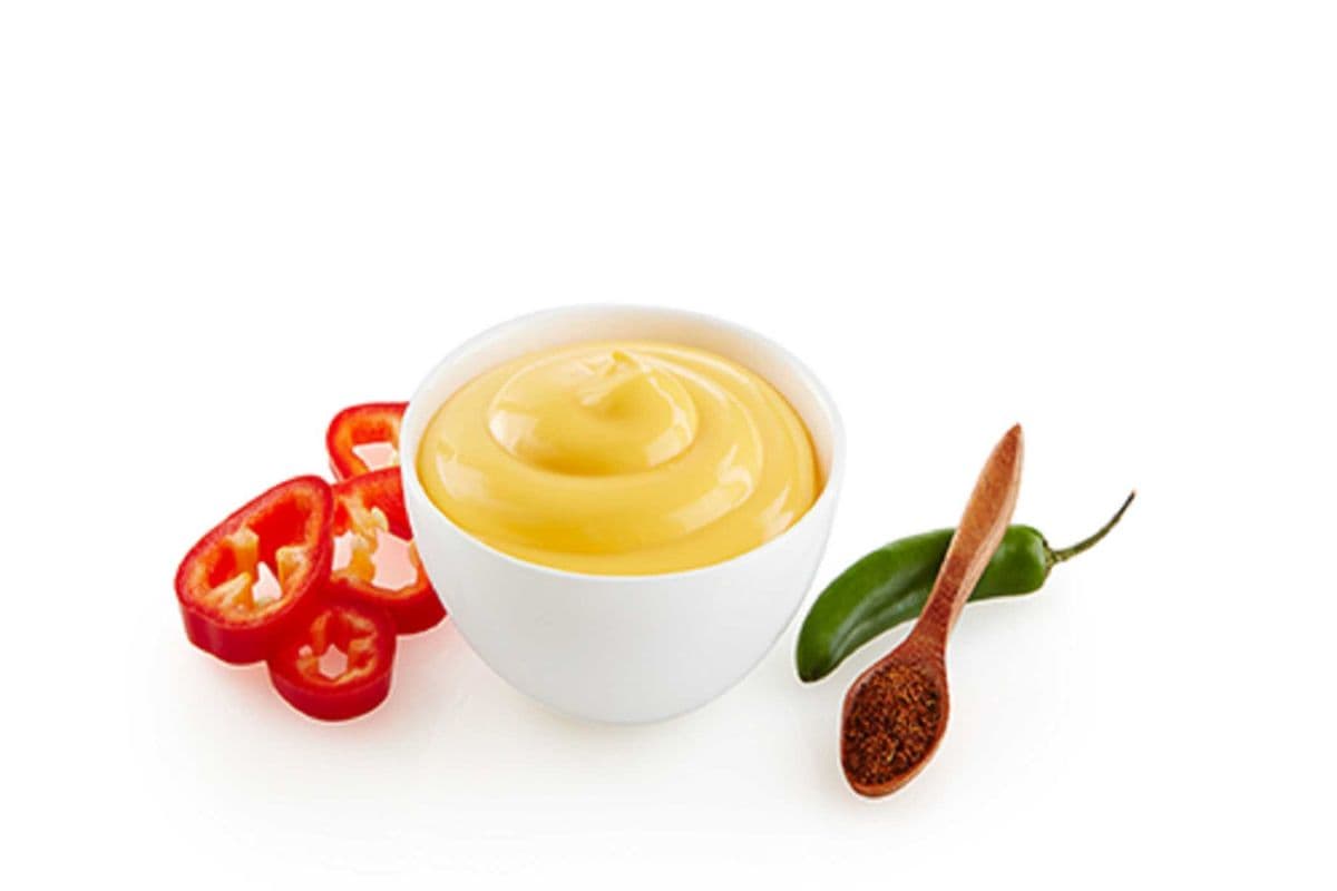 Nacho/Jalapeno Cheese (A little spicy but otherwise the same cheesy goodness as our regular cheddar cheese dipping sauce.)