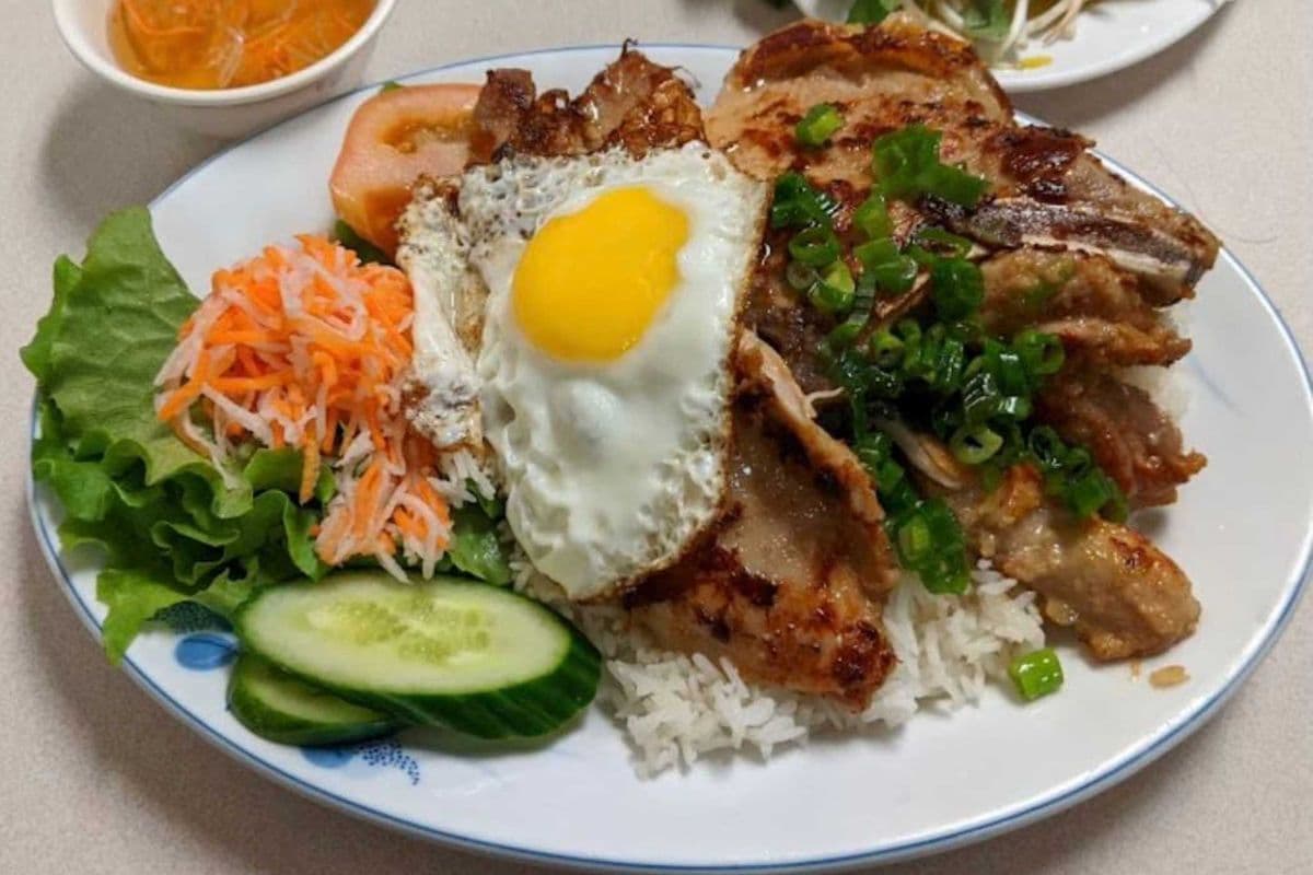 66. Fried Egg, Chicken, and Grilled Pork Chop with Rice