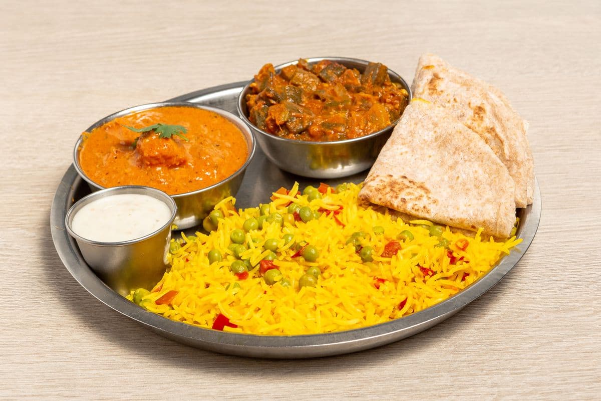 4. One Meat Curry, One Vegetable Curry, Rice, and Three Roti
