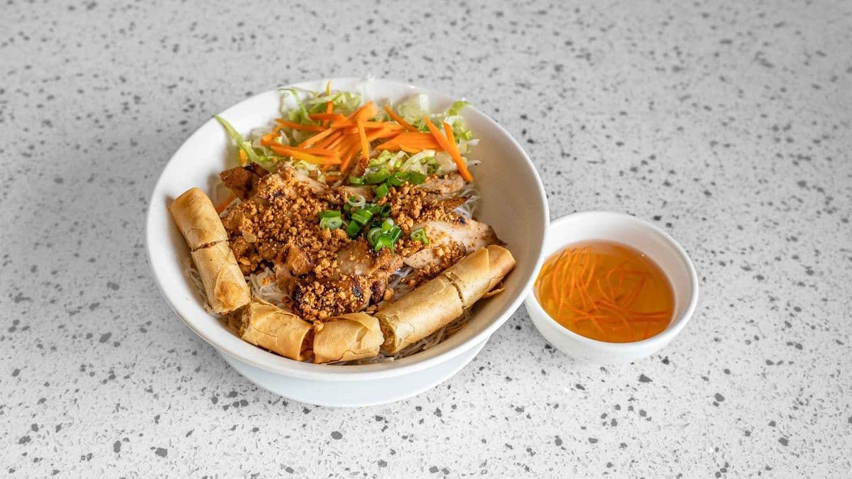 38. Charbroiled Lemongrass Chicken & Spring Rolls On Vermicelli