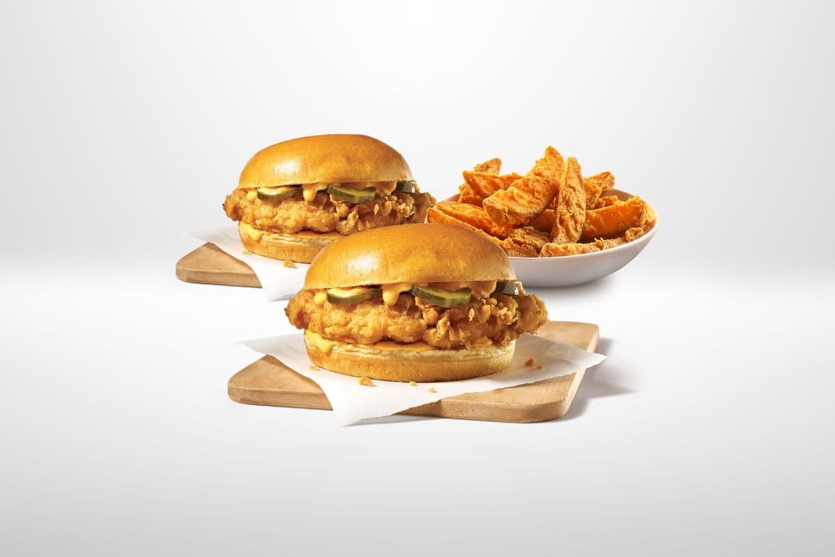 2 Crispy Chicken Sandwiches & 10 Wedges + 2 FREE Dips
