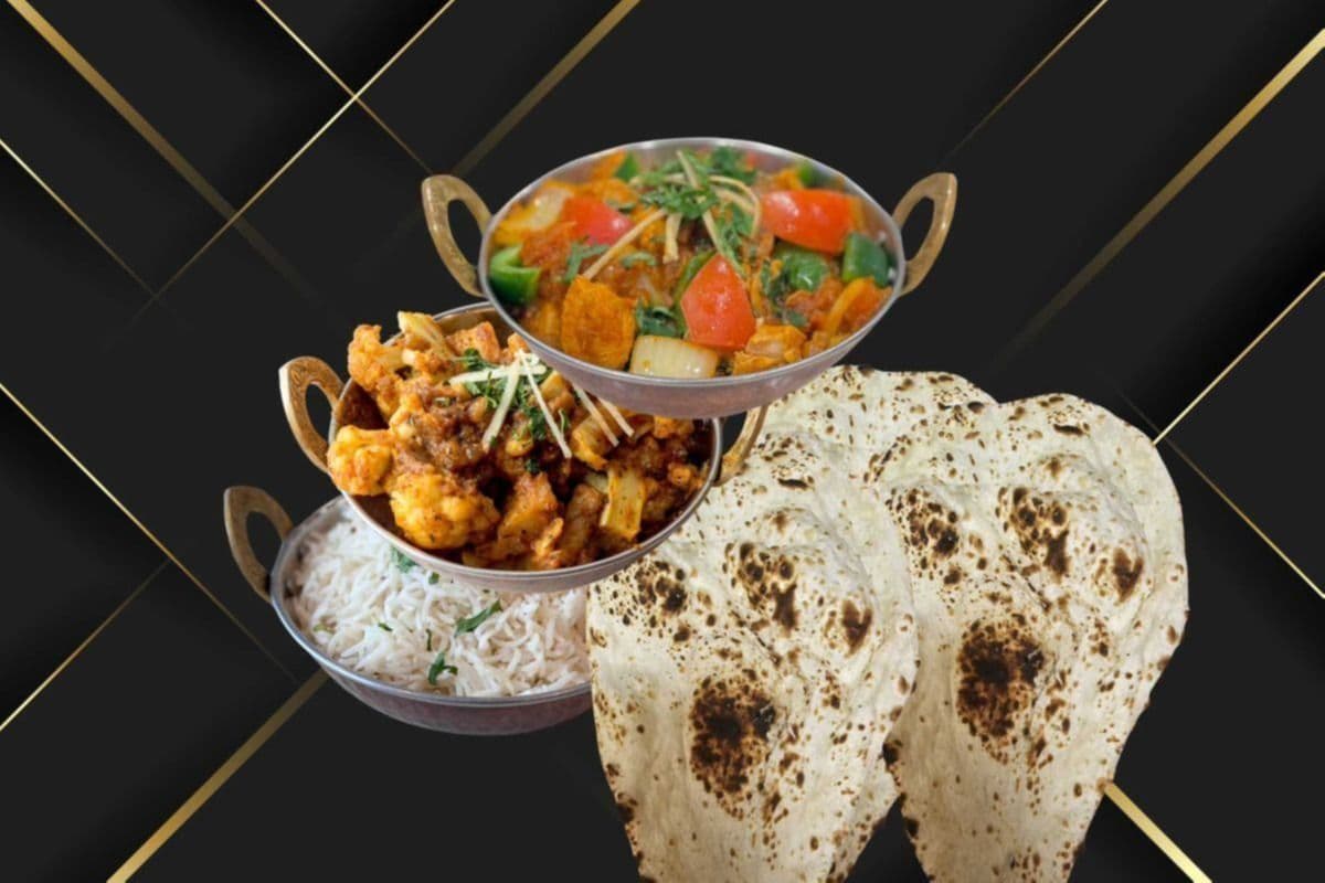 Karahi Chicken, Aloo Gobi, Rice, and Three Pieces of Naan