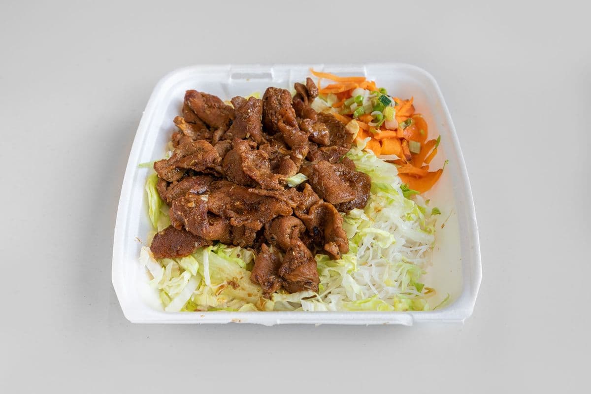 32. Charbroiled Pork and 2 Pork Spring Rolls