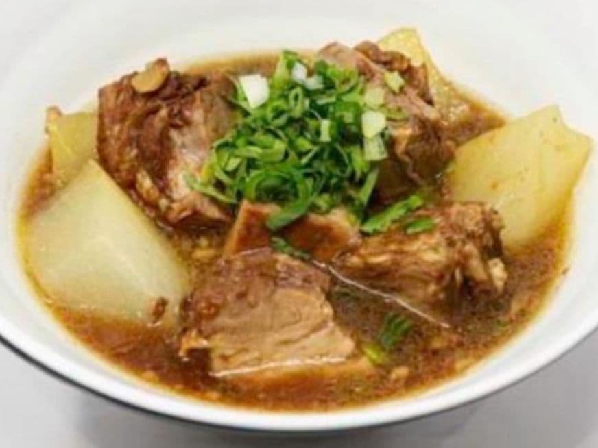 S11 Brisket de boeuf aux radis 独家秘制牛腩萝卜