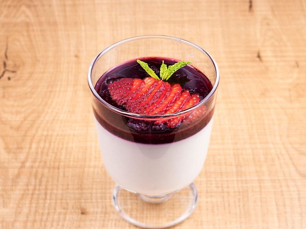 Coconut Panna Cotta (/w Berry Coulis)