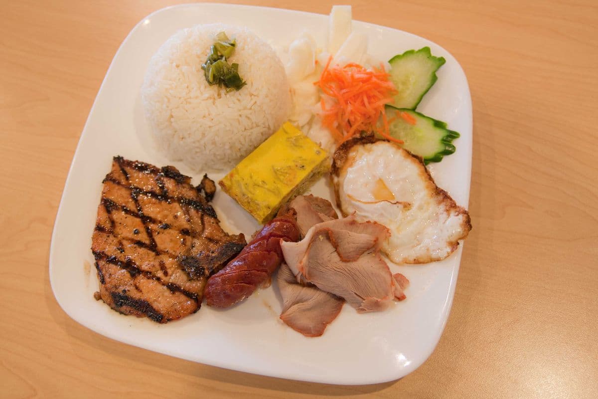 57- Jasmine Rice with Pork Chop, Crispy Pork Shreds, Steam Quiche, Fried Egg and Sausage (Dish)