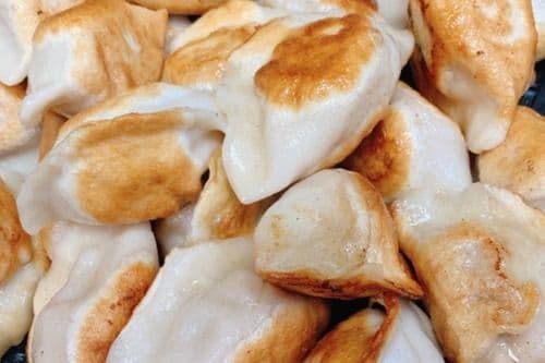A26. Homestyle Pan-Fried Cabbage and Pork Dumplings 東北煎餃