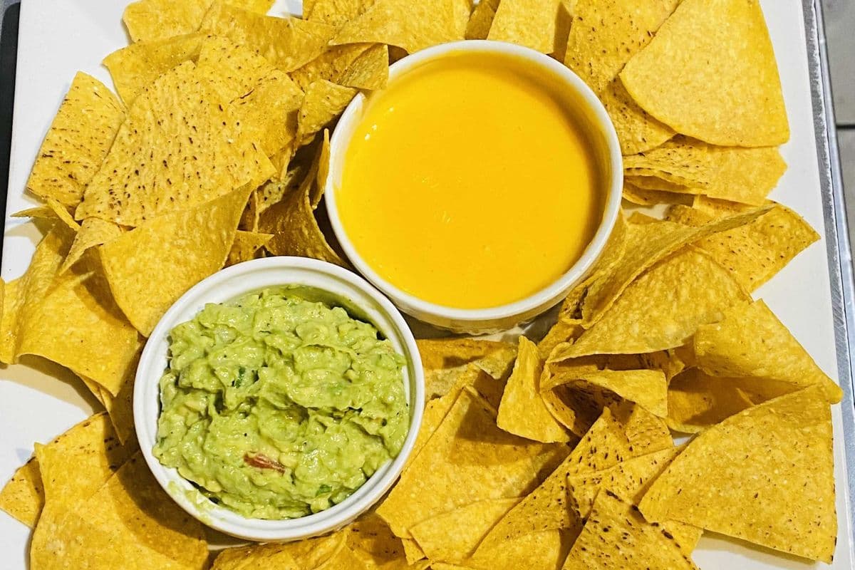 1. Guacamole And Queso Dip