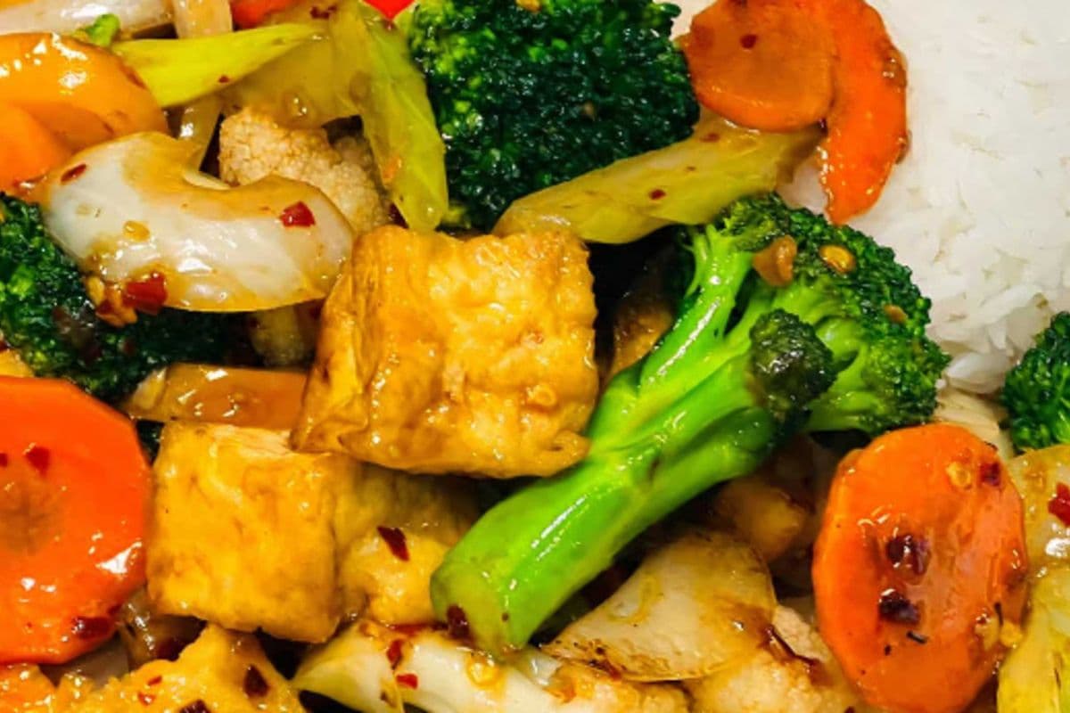 57. Stir-Fried Tofu with Mixed Vegetables on Steamed Rice