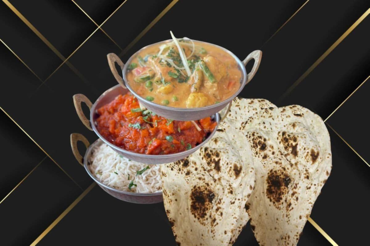 Vegetable Korma, Vegetable Jalfrazi, Rice, and Three Pieces of Naan