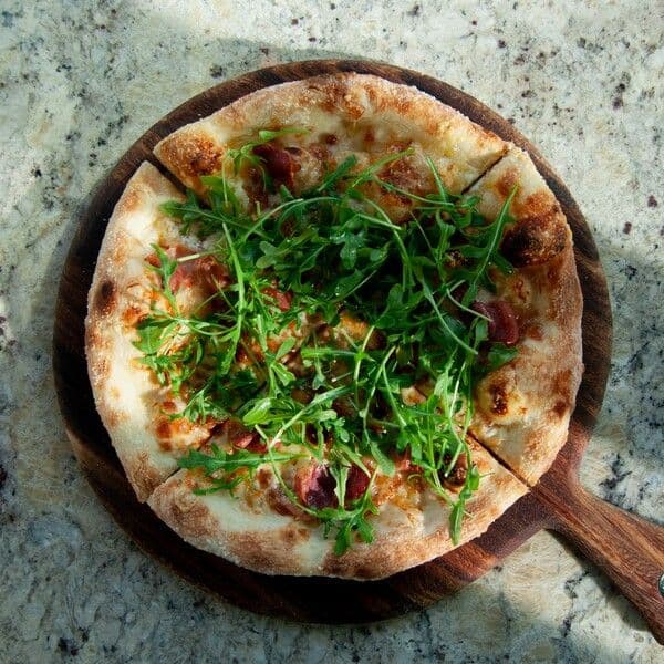 Prosciutto + Caramelized Onions Pizza