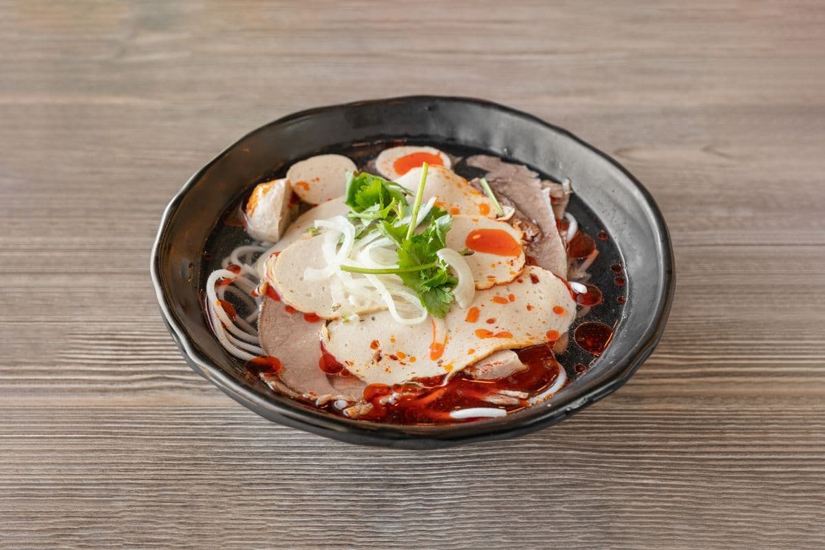 20. Thick Vermicelli Noodle Soup with Brisket, Pork Ham, and Chicken Balls