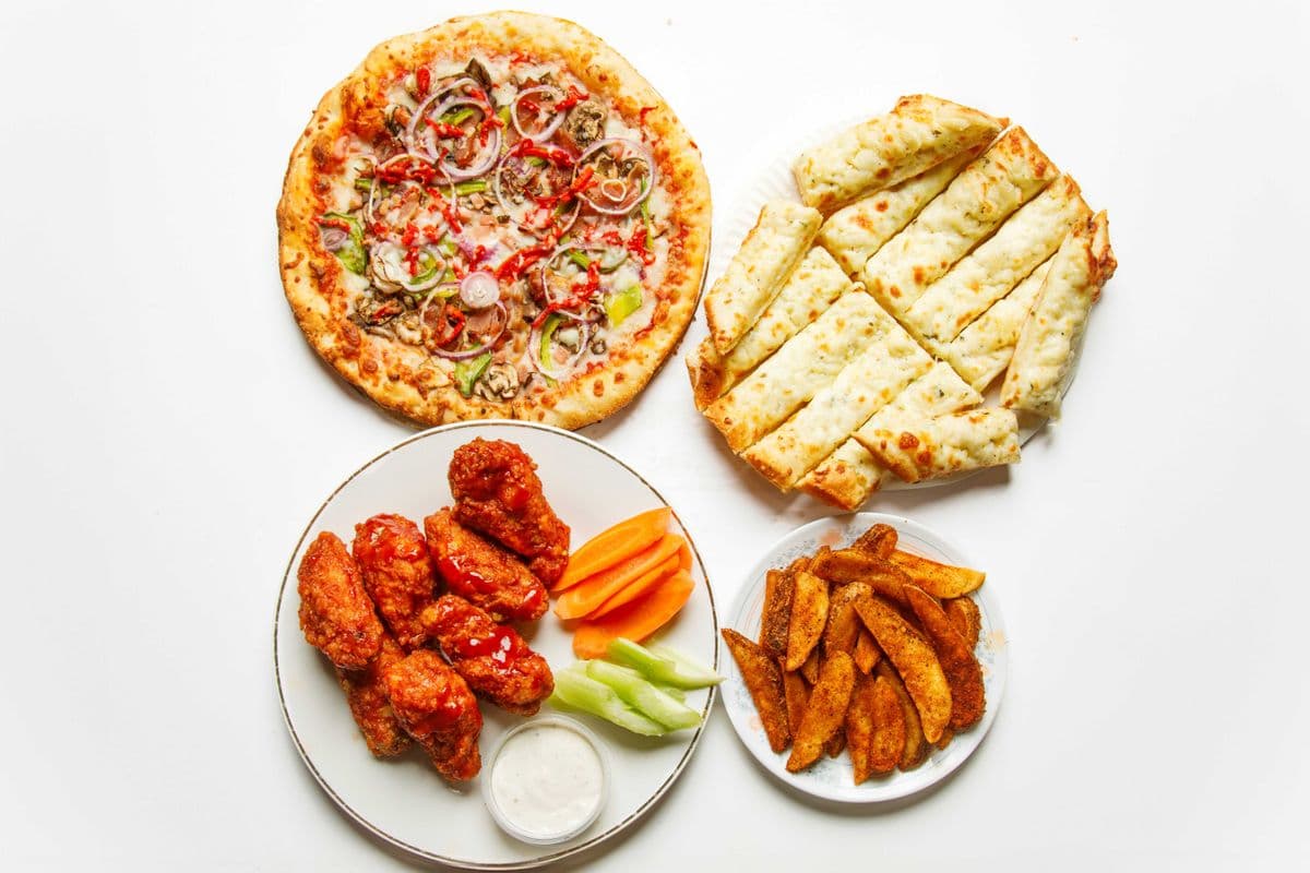 1 Pizza-3 Toppings, 1Lb Chicken Wings, 10 Wedges, Garlic Bread or Planet Sticks with Cheese