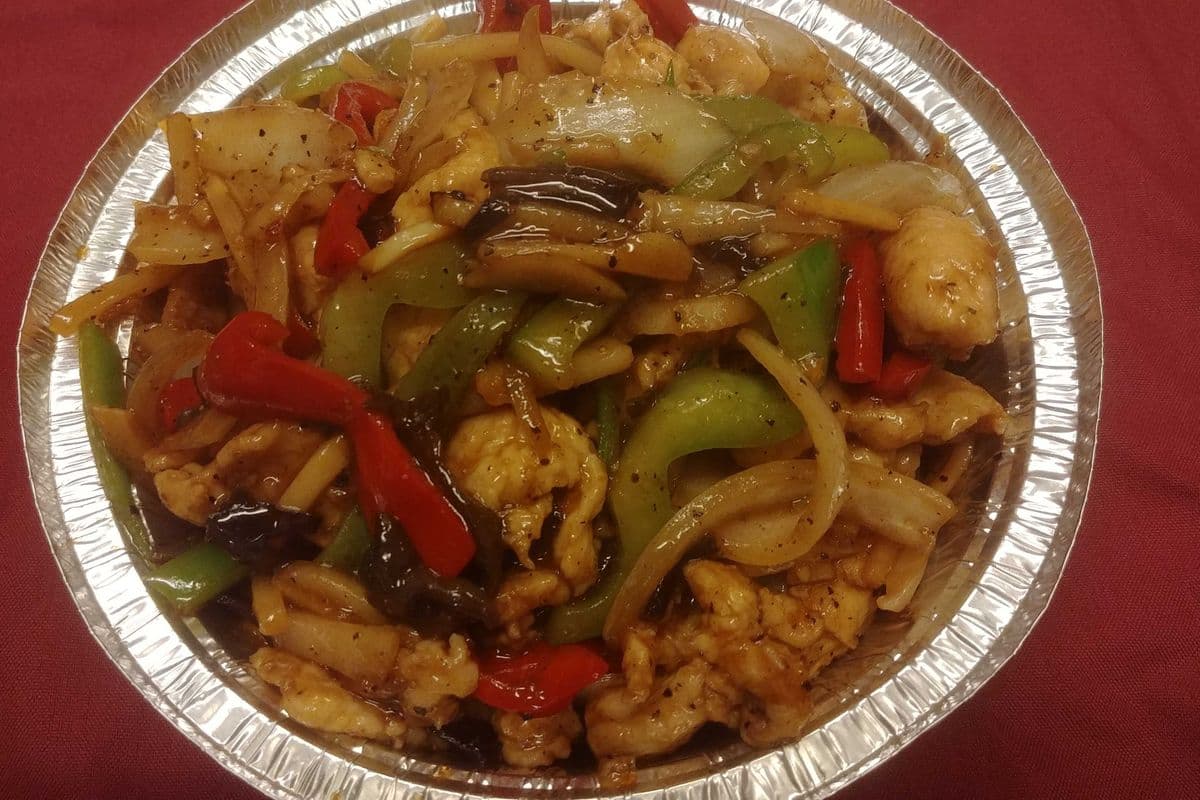 60. Poulet grésillant / Sizzling Chicken